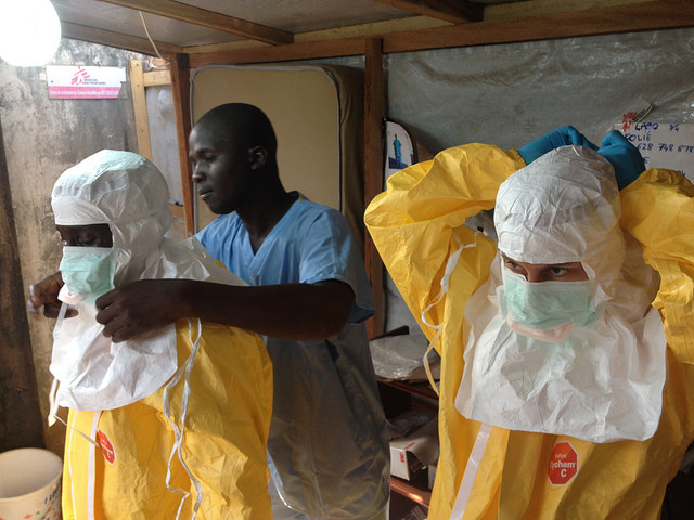 Health care workers in Guinea suit up before approaching patients infected with Ebola in the early days of an outbreak that has become a world health emergency. But it’s not the only one. (Photo by the European Commission.)