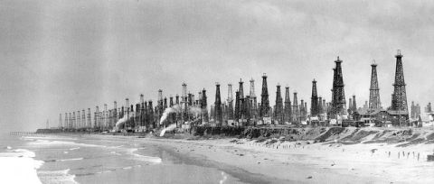 What America will look like of the frackers have their way -- and what Huntington Beach, California looked like in 1926. But according to the IEA’s World Energy Outlook, we shouldn’t be too concerned about what the frackers are going to be able to do.  (Photo courtesy Orange County Archives)   