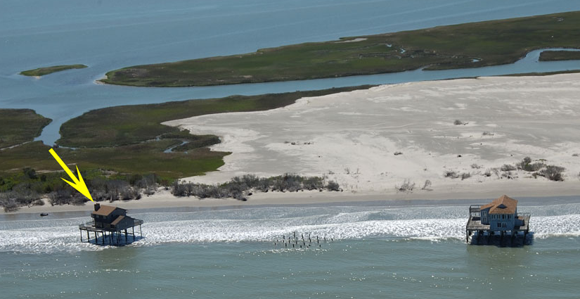 Going, going....  How is it we let one of our islands get away from us without learning anything? (Photo by Highcamera Aerial Photography Service) 