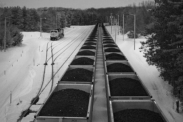 A coal train once supplied the city of Holland, Michigan with fuel for its electric generating plant. They converted the plant to natural gas. Their costs are down, their emissions are down, and coal is down for the count.  (Photo by wsilver/Flickr) 